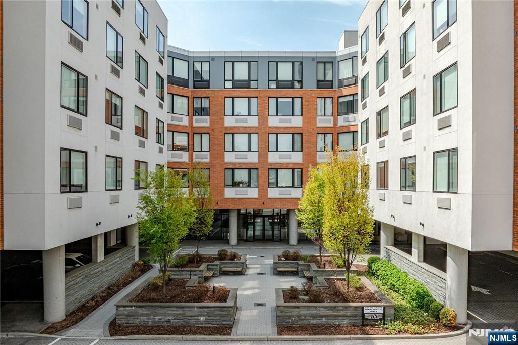 a front view of a building with street view