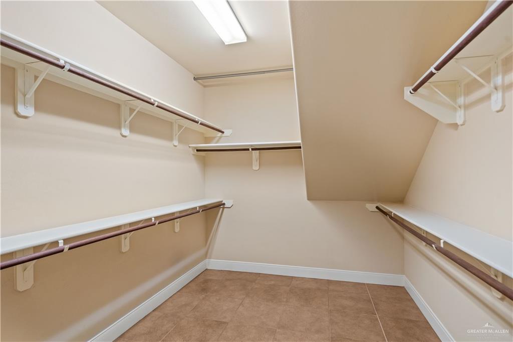 2806 San Ricardo Street Mission, TX 78572 - Photo 24 of 29 a view of a room with racks on the wall