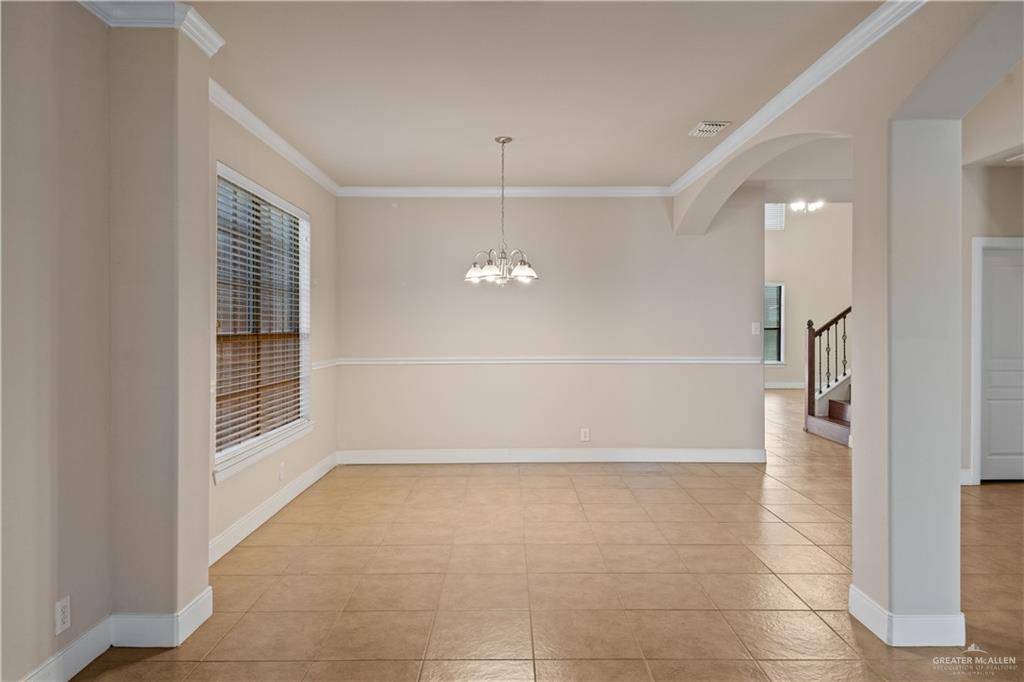 2806 San Ricardo Street Mission, TX 78572 - Photo 3 of 29 an empty room with a windows and cabinet