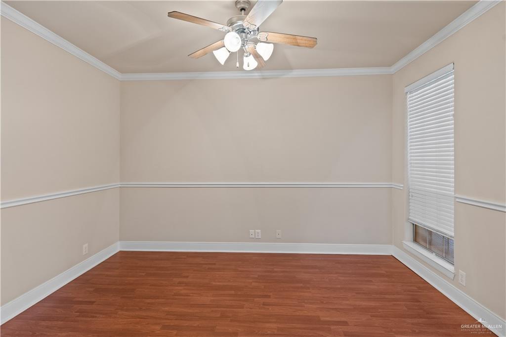 2806 San Ricardo Street Mission, TX 78572 - Photo 4 of 29 a view of a room with wooden floor and fan