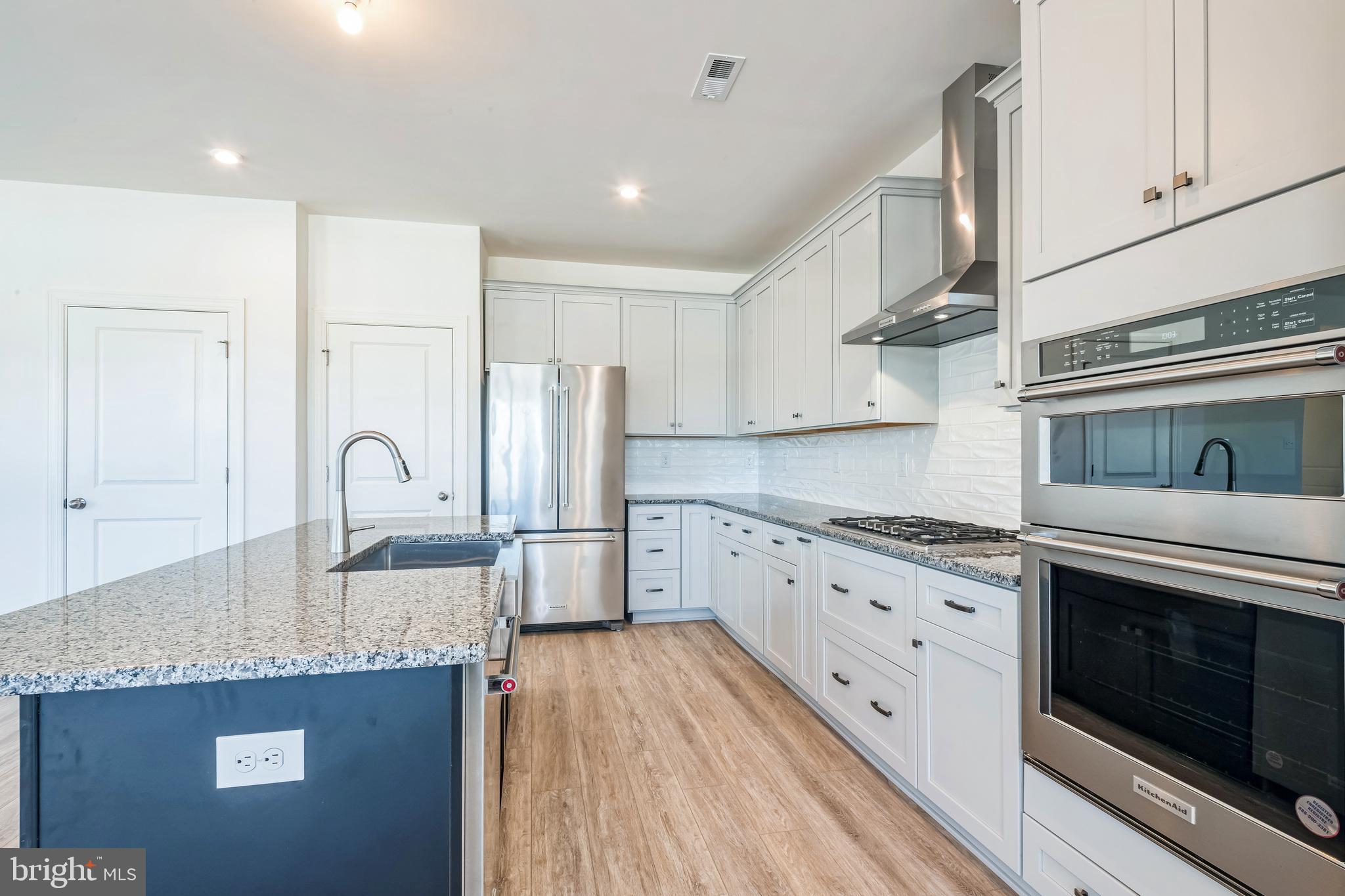 21 Plymouth Road Sicklerville, NJ 08081 - Photo 6 of 23 a kitchen with stainless steel appliances granite countertop a stove a sink and a refrigerator