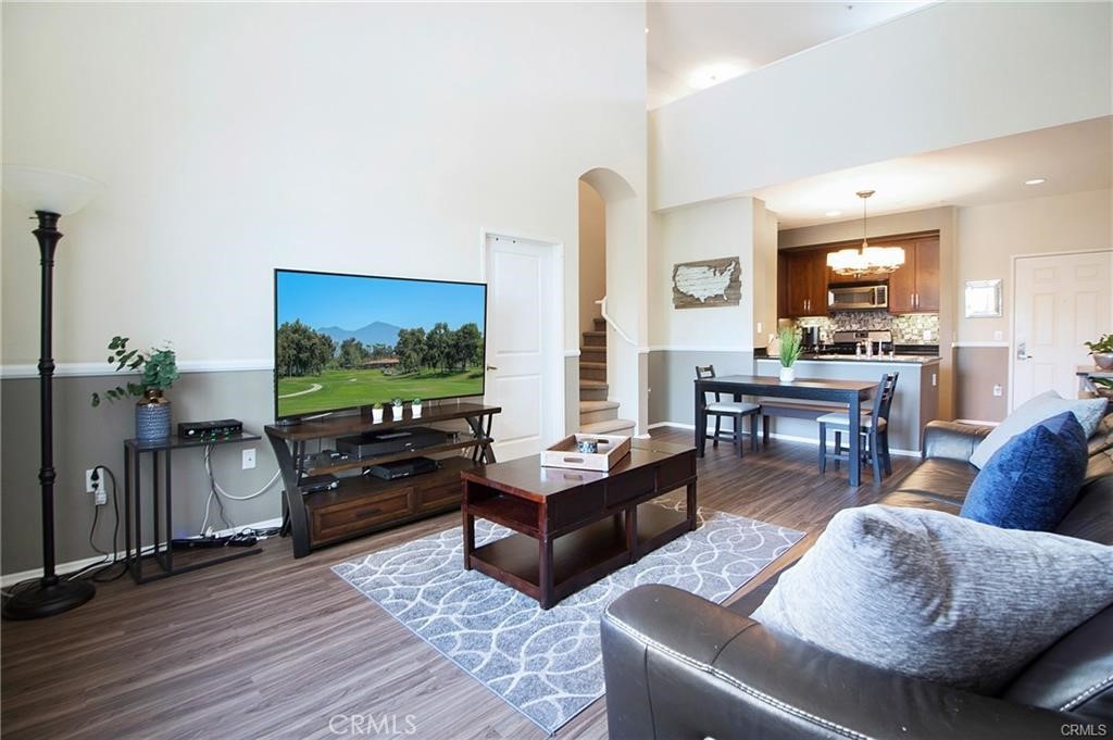 2420 Scholarship Irvine, CA 92612 - Photo 1 of 17 a living room with furniture and a flat screen tv
