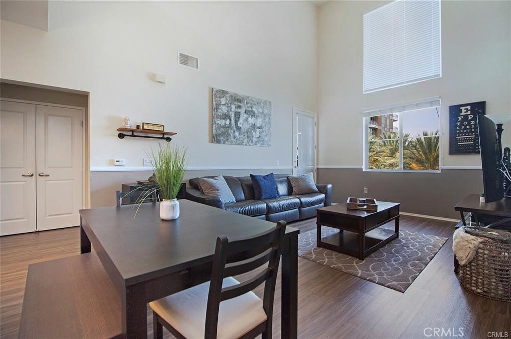 2420 Scholarship Irvine, CA 92612 - Photo 2 of 17 a view of a dining room with furniture and wooden floor