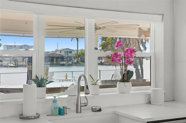 a dining table seating room with furniture and window