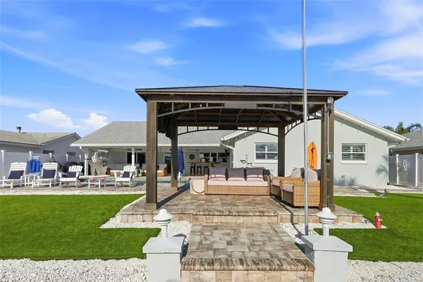 a view of a house with a yard