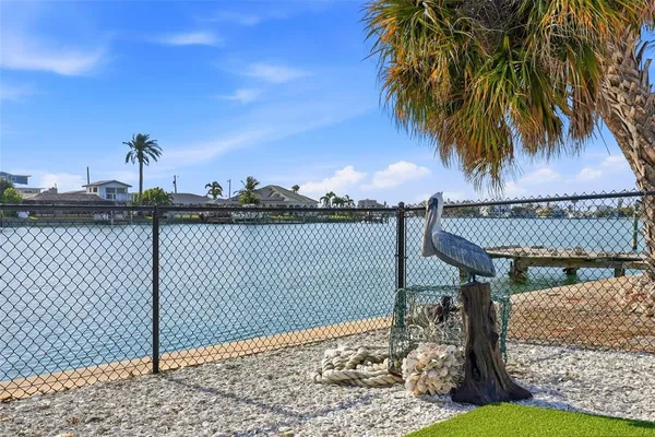 a view of a roof deck with wooden fence