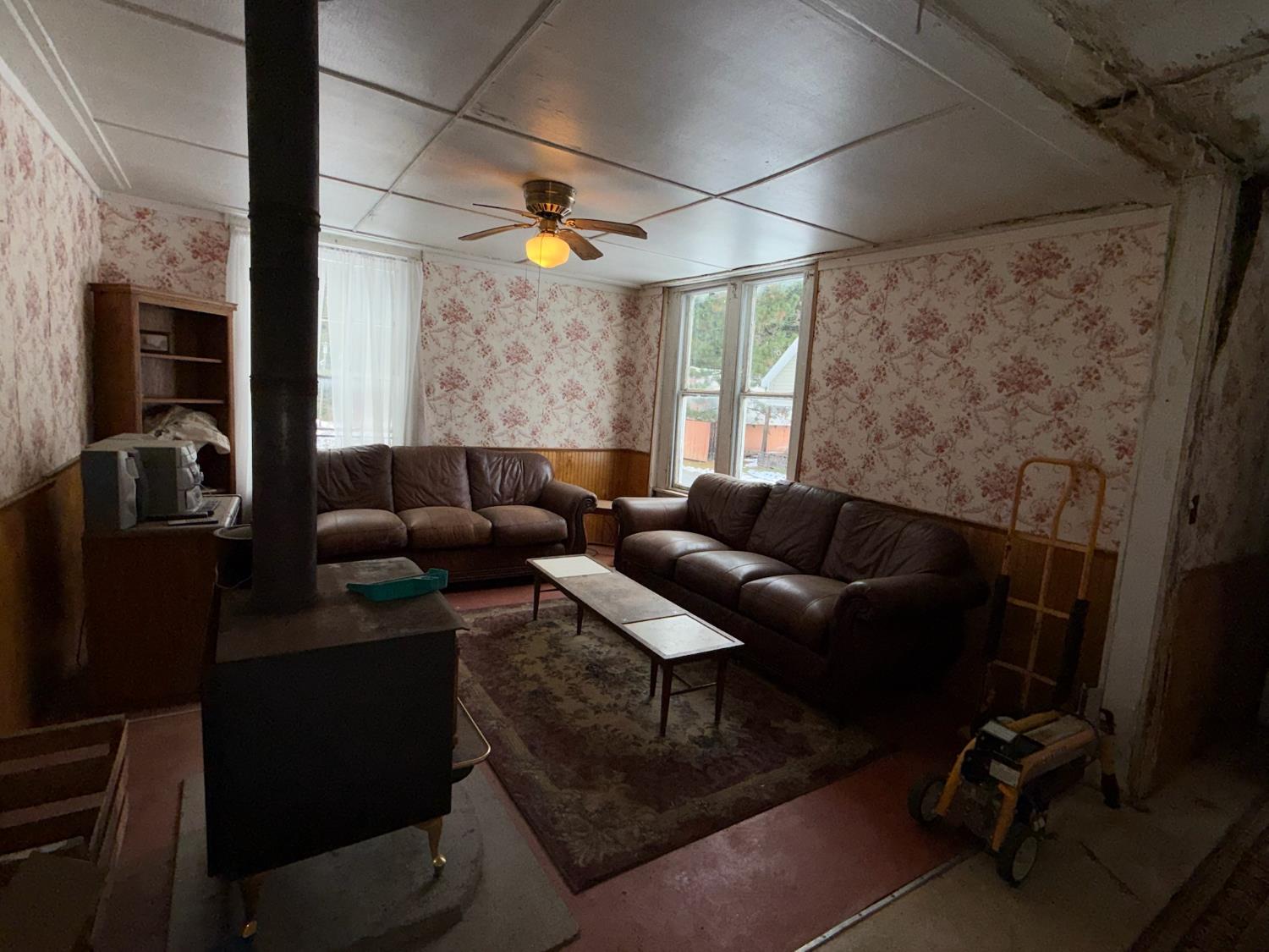 208 Main Street Alleghany, CA 95910 - Photo 13 of 24 a living room with furniture and a window