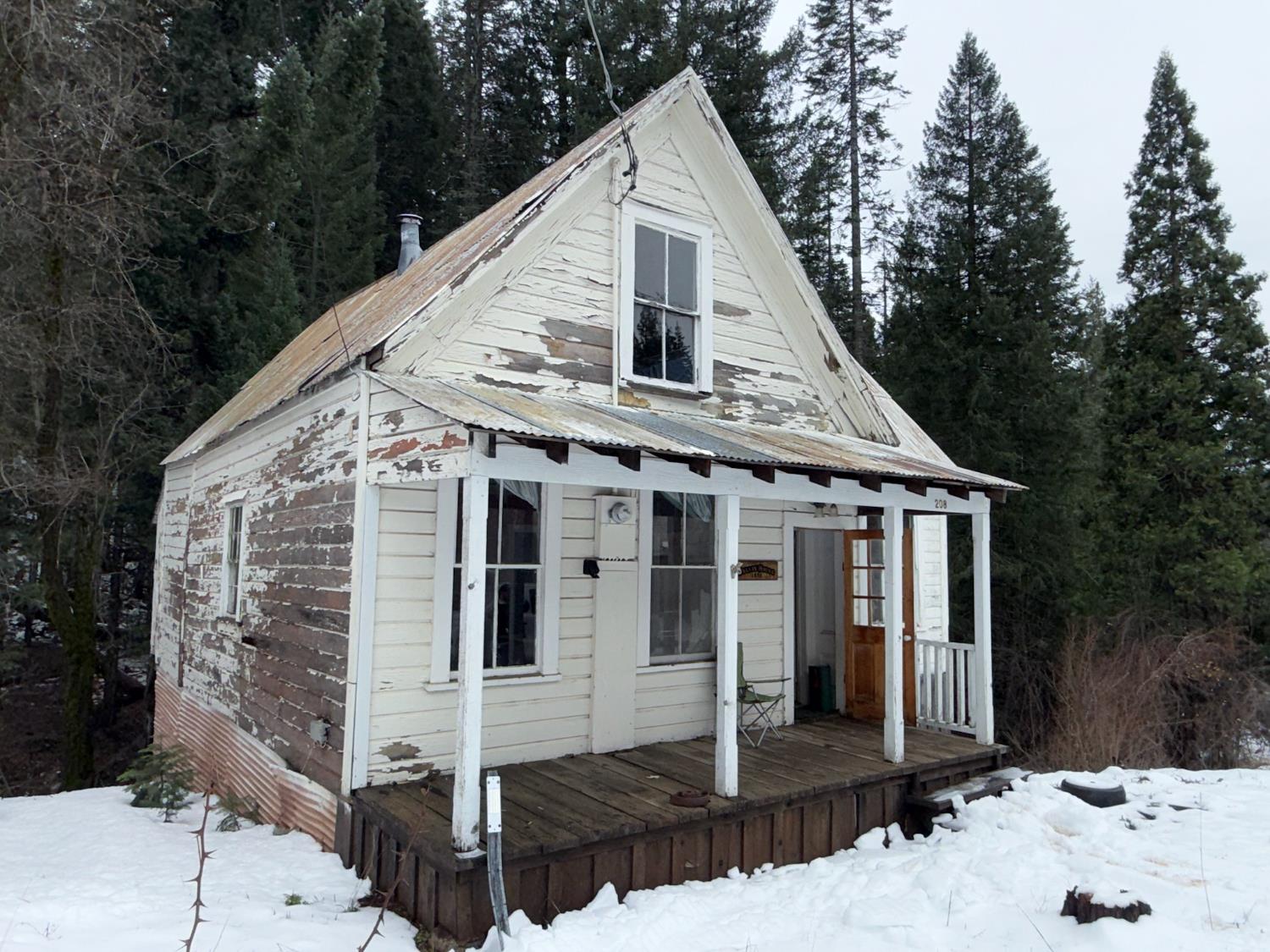 208 Main Street Alleghany, CA 95910 - Photo 15 of 24 a view of a house with a yard