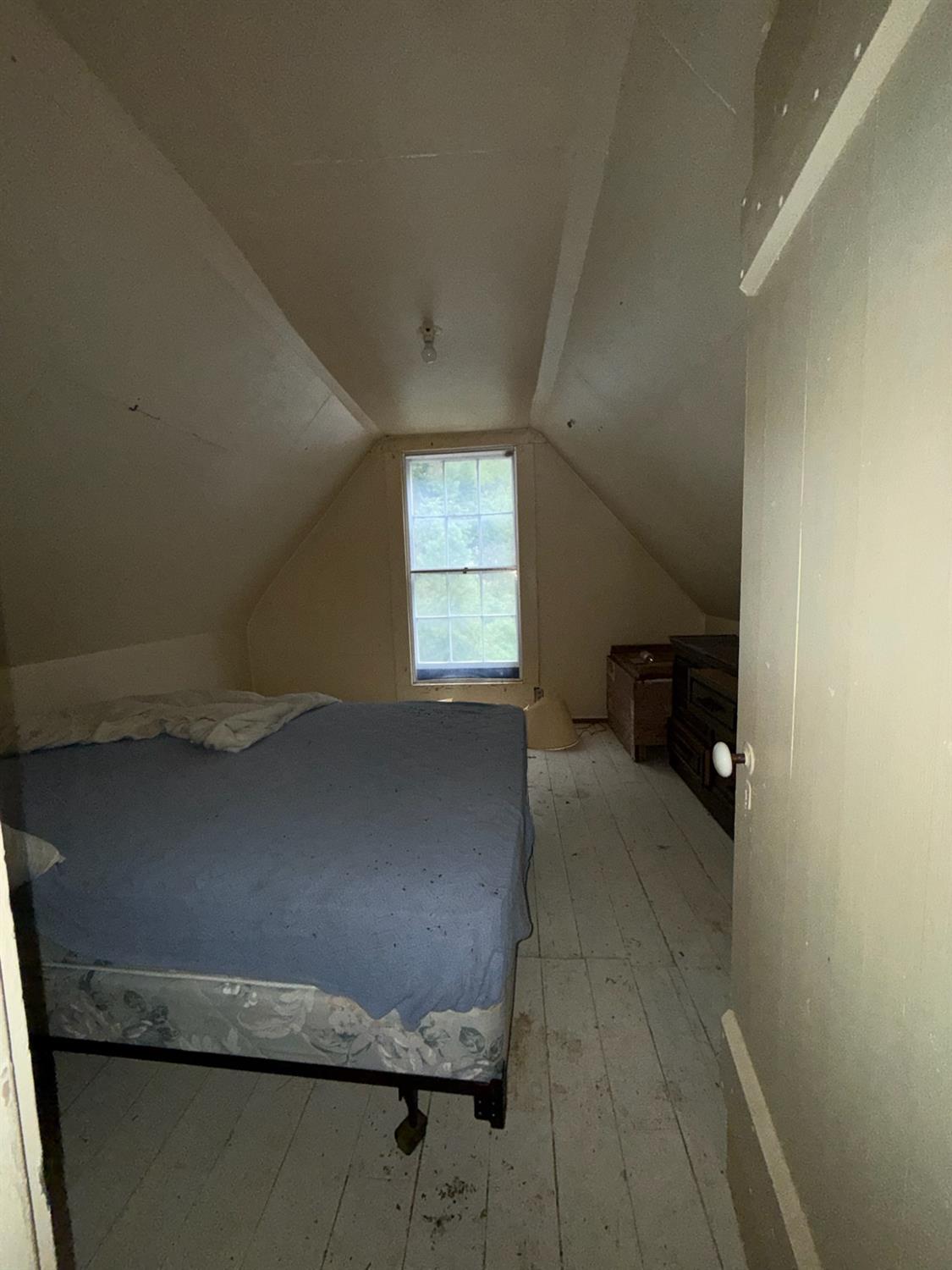 208 Main Street Alleghany, CA 95910 - Photo 9 of 24 a living room with furniture and a window