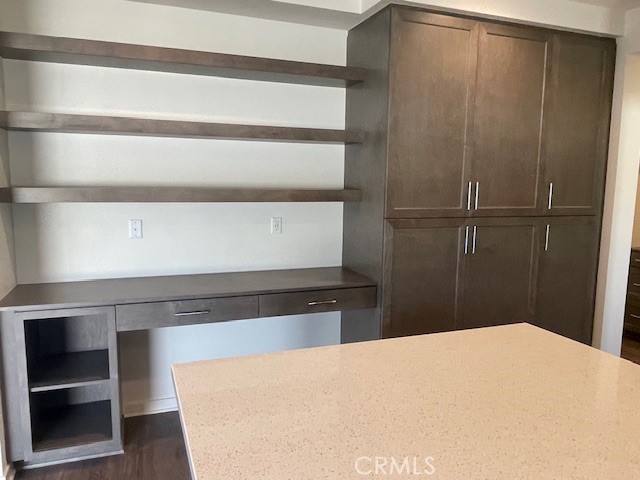 31960 Chagall Way Yucaipa, CA 92399 - Photo 10 of 12 a bedroom with a bed and cabinet