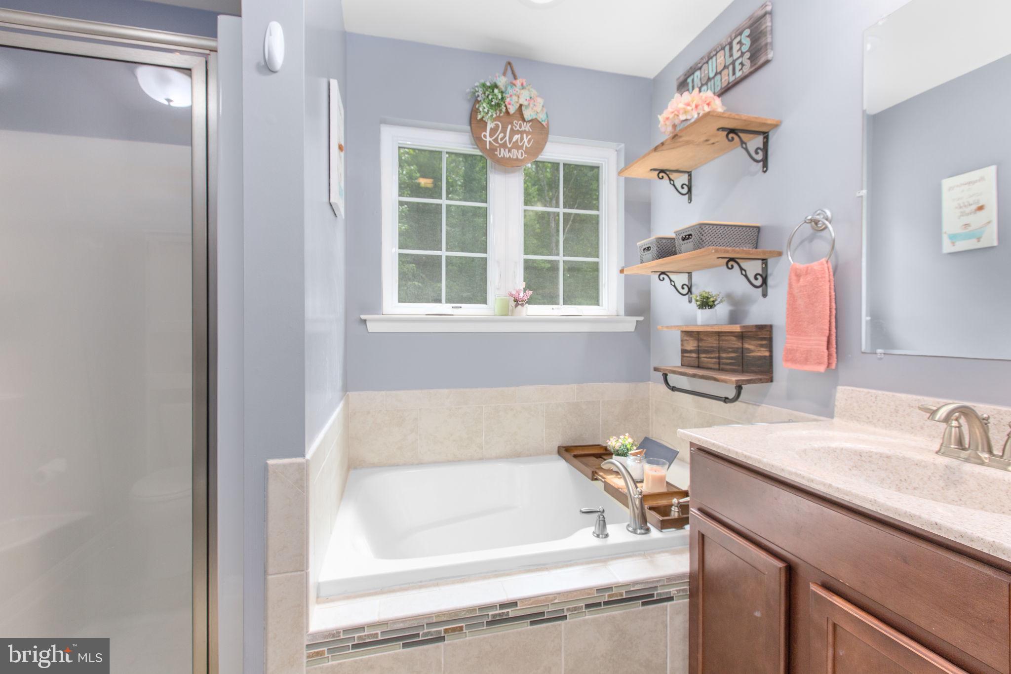 4659 Turkey Acres Road King George, VA 22485 - Photo 25 of 54 Roomy soaking tub has recessed lighting