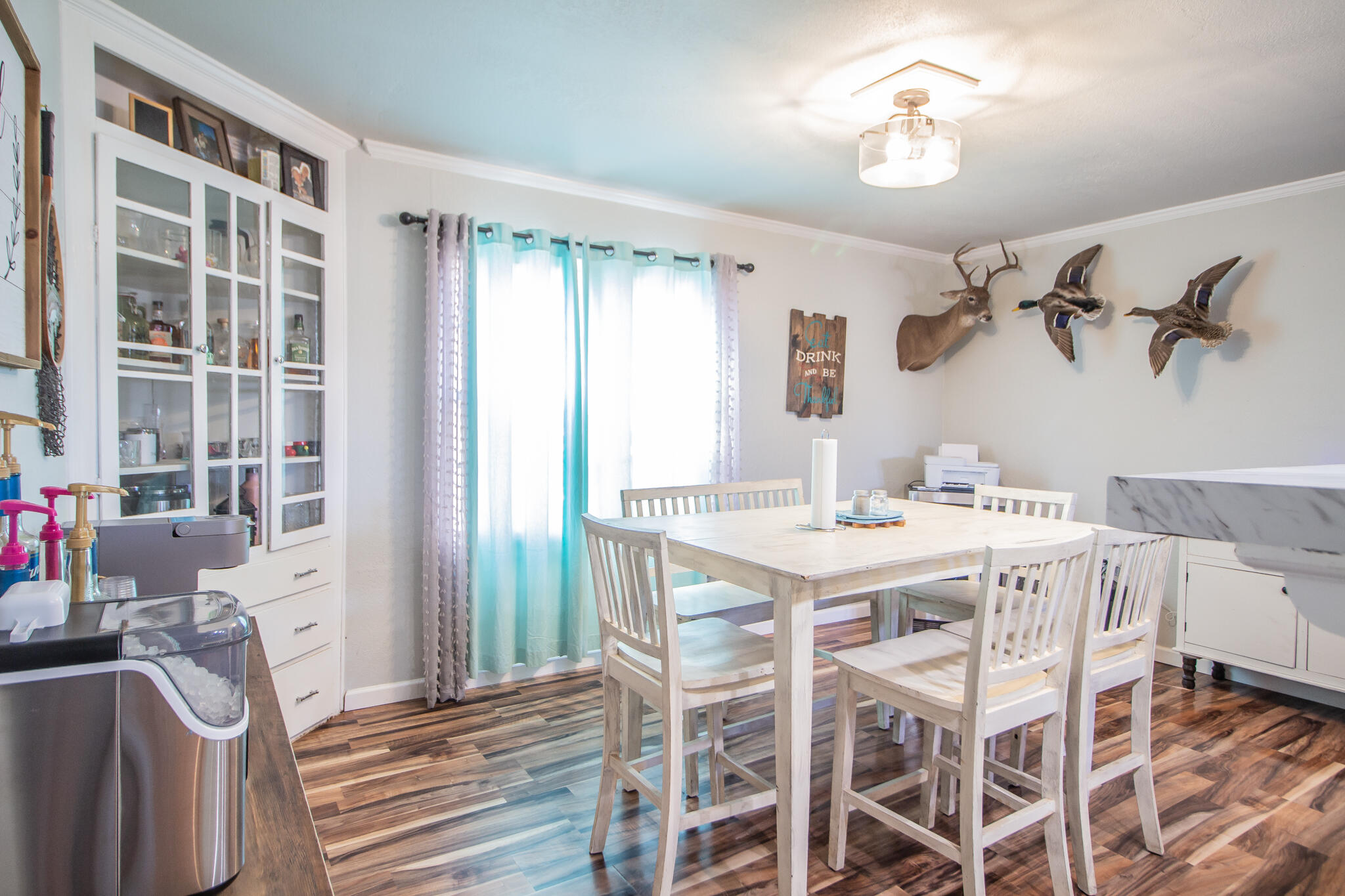 6403 23rd Street Lubbock, TX 79407 - Photo 12 of 29 a view of a dining room with furniture and chandelier