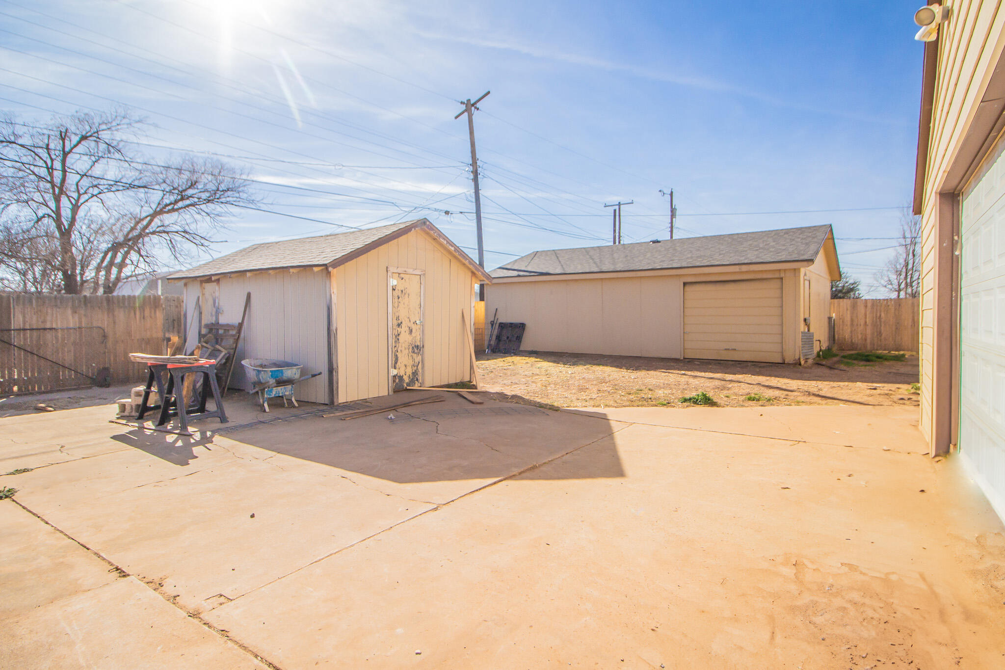 6403 23rd Street Lubbock, TX 79407 - Photo 26 of 29 a view of a kitchen with a sink and a water fall