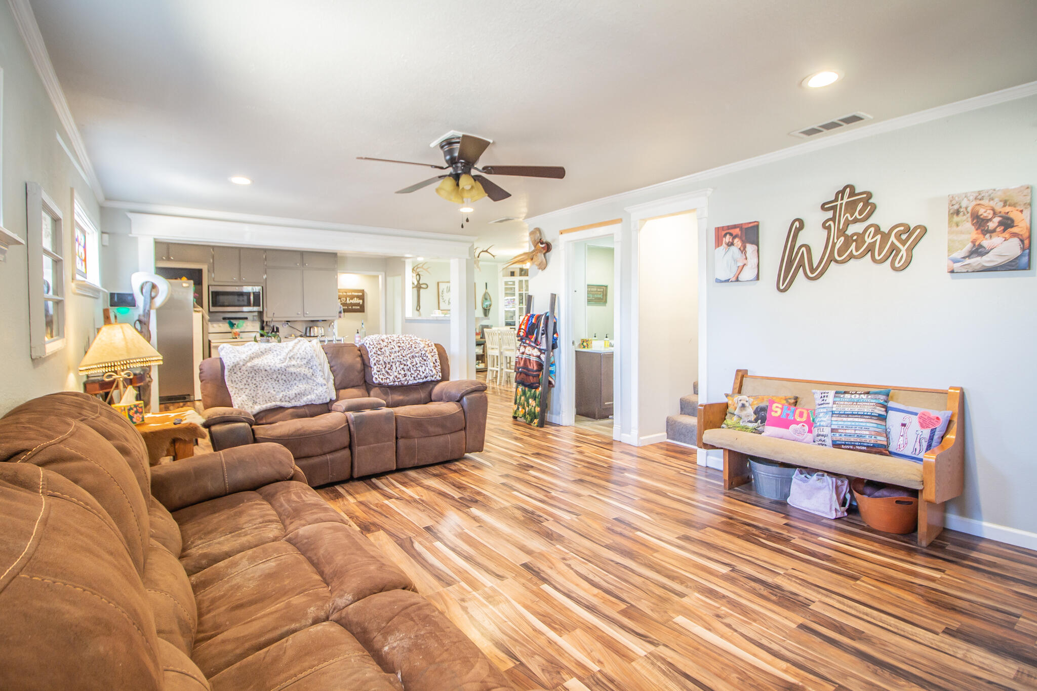 6403 23rd Street Lubbock, TX 79407 - Photo 6 of 29 a living room with furniture and a wooden floor