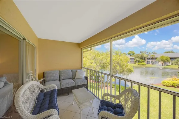 a balcony view with a couch