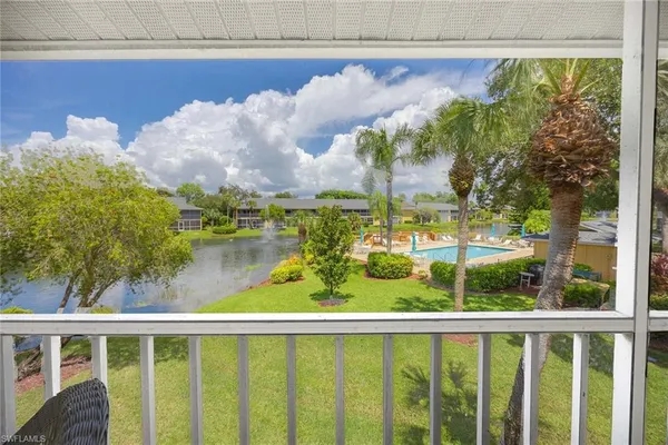 a view of a lake from a balcony