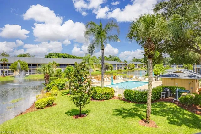 a view of swimming pool with a garden