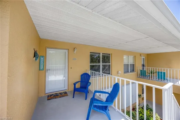 a view of a porch with furniture