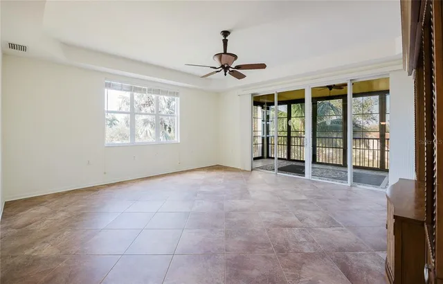 a view of hallway with windows