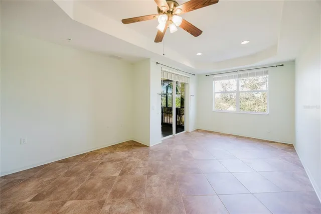 a bathroom with a double vanity sink mirror and shower