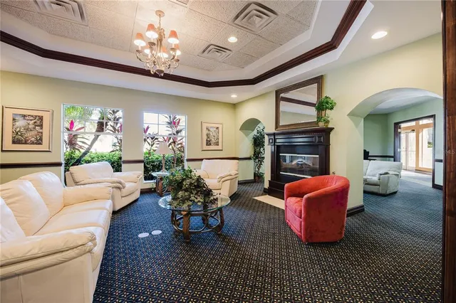 a front view of a house with a garden and a yard