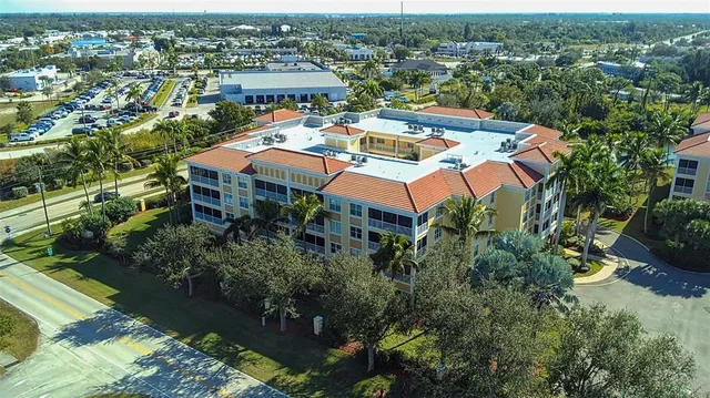 an aerial view of residential house with outdoor space and street view