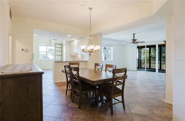 a kitchen with stainless steel appliances a refrigerator and a sink