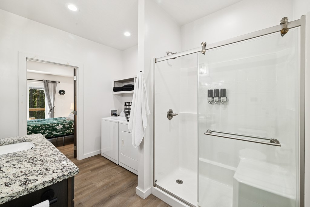 345 Deer Trail Mineral Bluff, GA 30559 - Photo 11 of 31 a bathroom with a shower and a sink