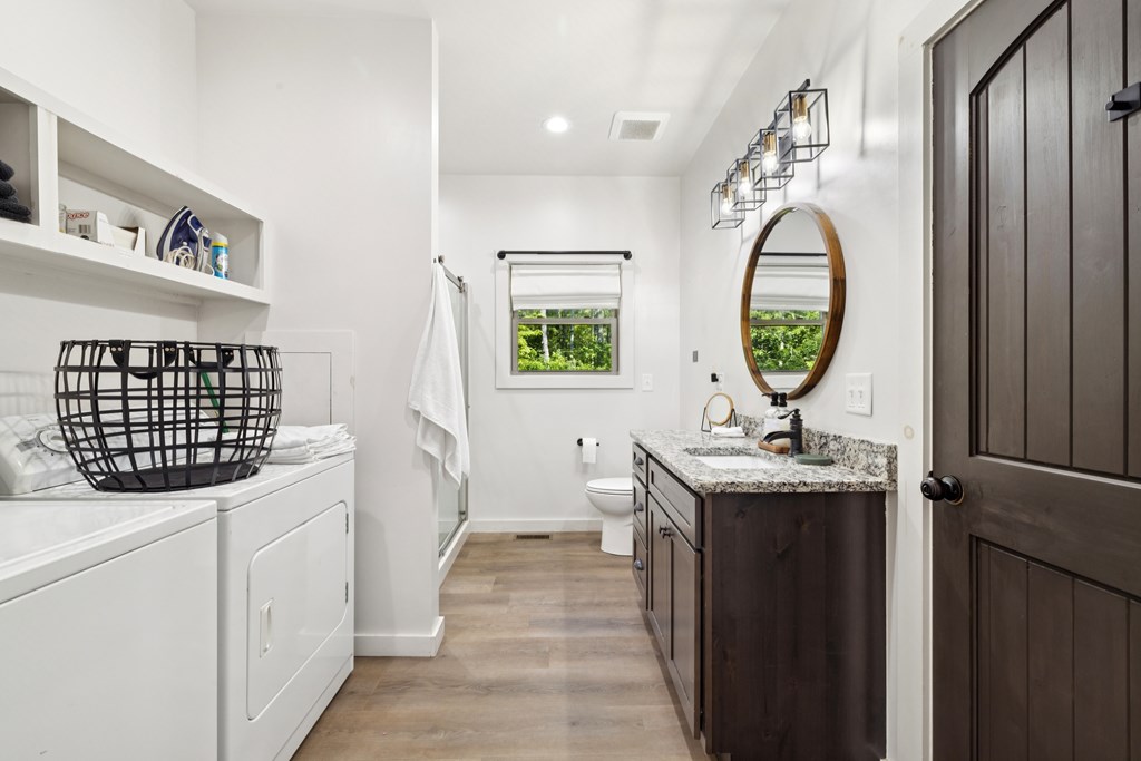 345 Deer Trail Mineral Bluff, GA 30559 - Photo 12 of 31 a view of living room with washer and dryer