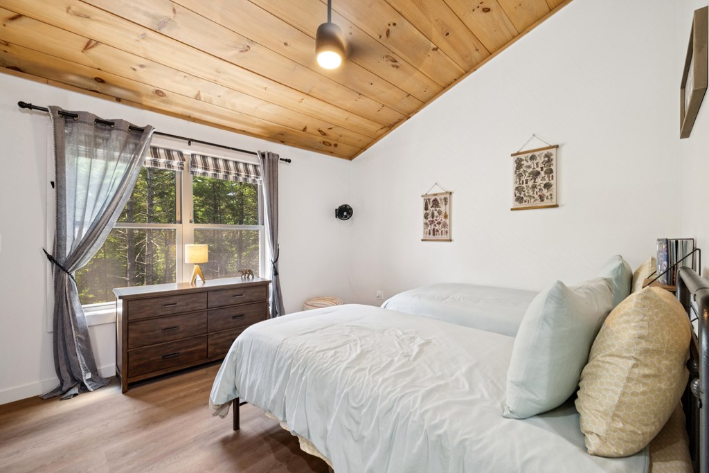 345 Deer Trail Mineral Bluff, GA 30559 - Photo 19 of 31 a bedroom with a bed and a window