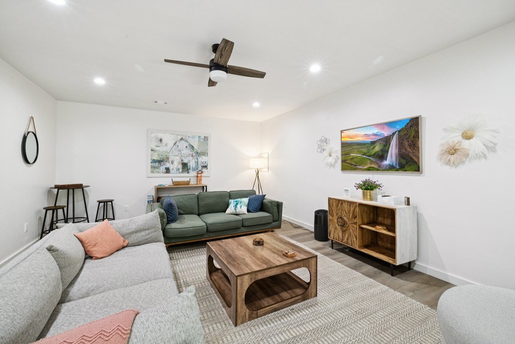 345 Deer Trail Mineral Bluff, GA 30559 - Photo 23 of 31 a living room with furniture and a flat screen tv