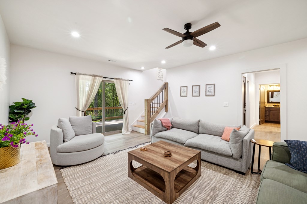 345 Deer Trail Mineral Bluff, GA 30559 - Photo 7 of 31 a living room with furniture and a large window