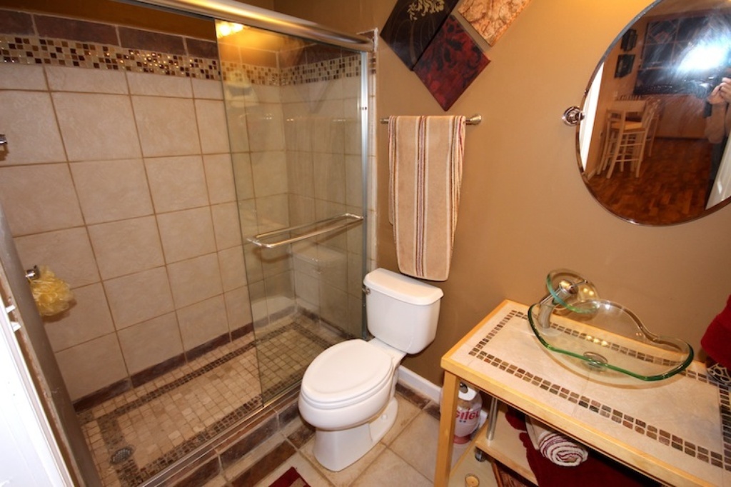 806 Cobblefield Road Champaign, IL 61822 - Photo 14 of 20 a bathroom with a toilet and a mirror