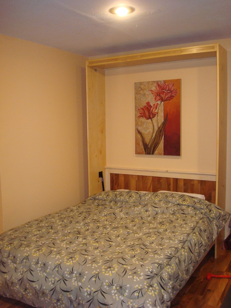 806 Cobblefield Road Champaign, IL 61822 - Photo 17 of 20 a bedroom with a bed and painting on the wall