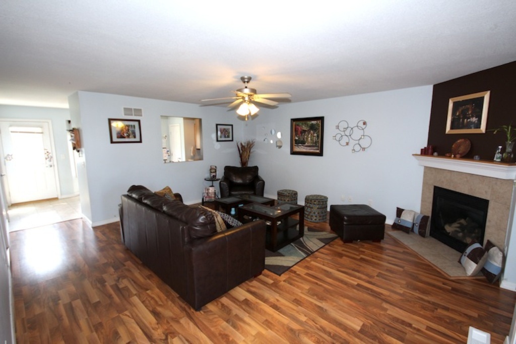 806 Cobblefield Road Champaign, IL 61822 - Photo 2 of 20 a living room with furniture and a fireplace