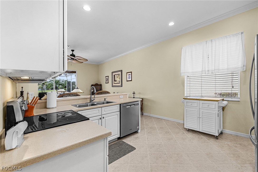 2090 Oxford Ridge Circle Lehigh Acres, FL 33973 - Photo 12 of 27 a room with storage and utility