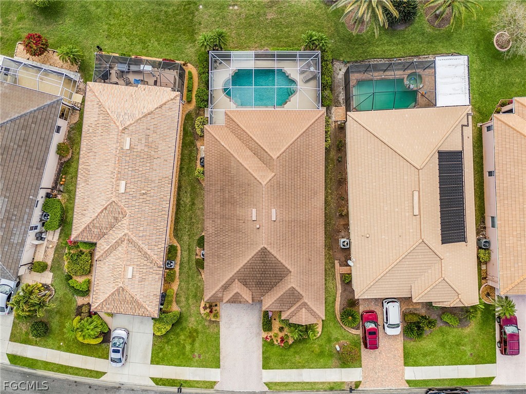 2090 Oxford Ridge Circle Lehigh Acres, FL 33973 - Photo 24 of 27 an aerial view of a house