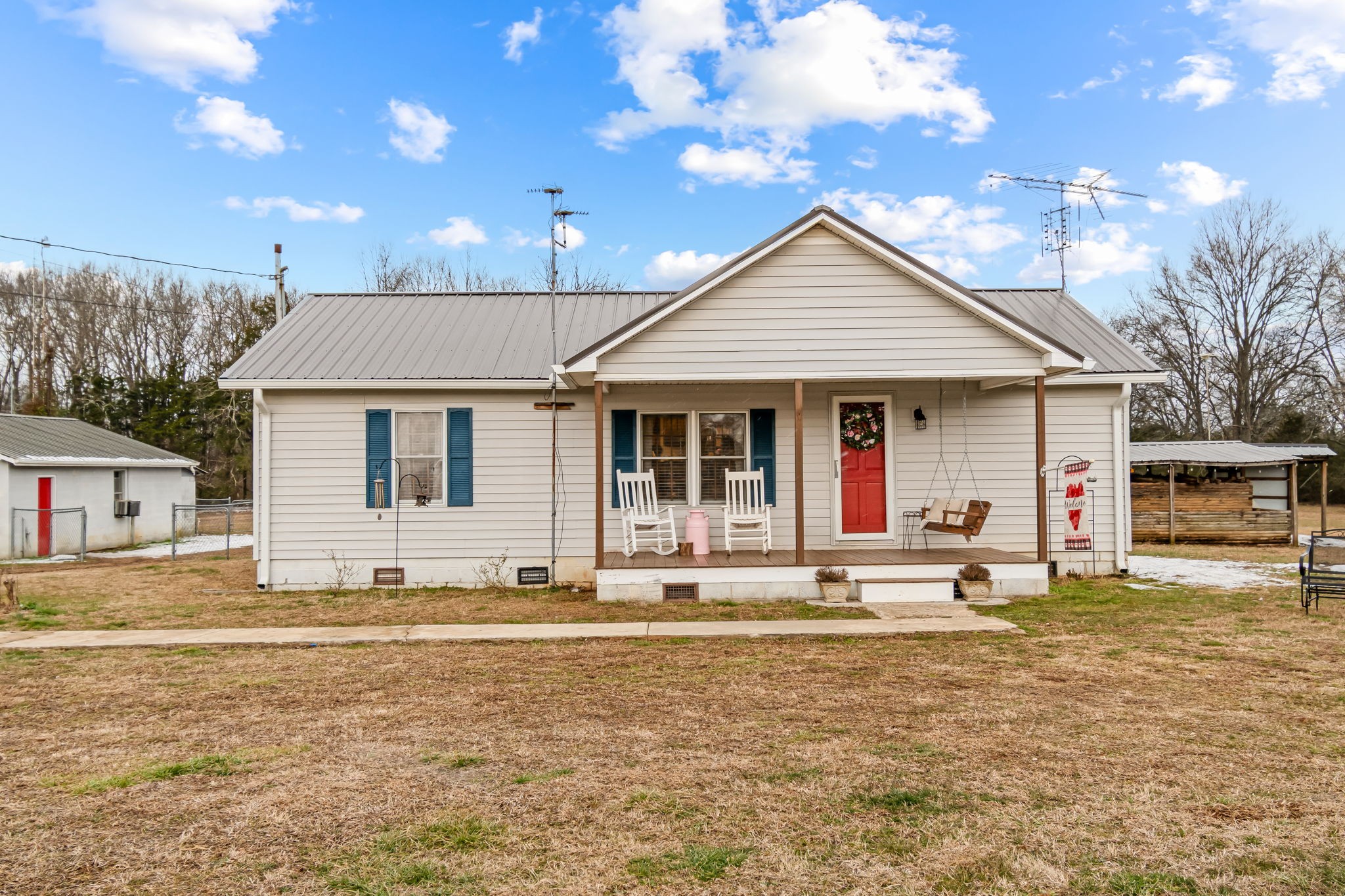 a front view of a house with a outdoor space
