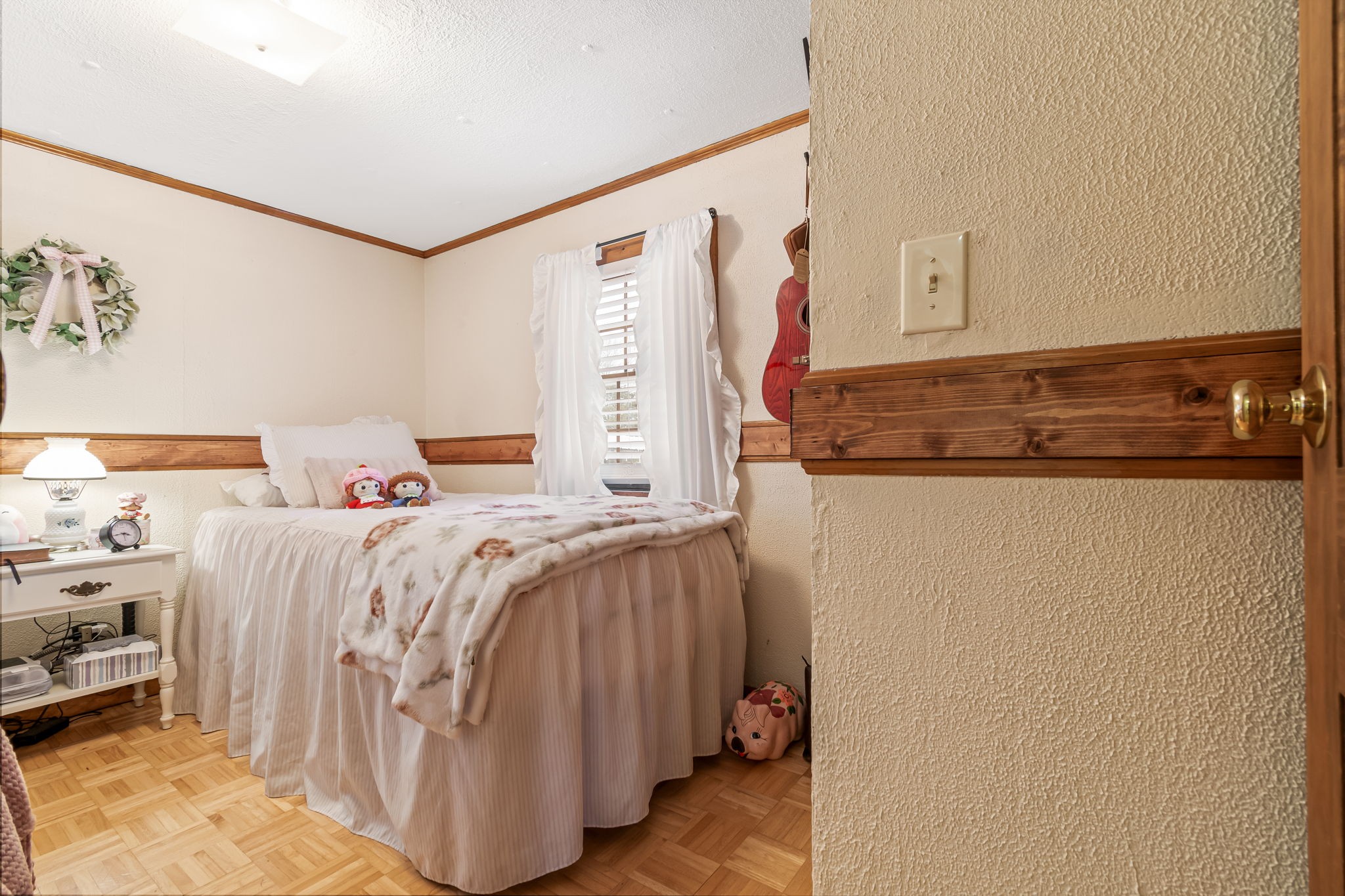 253 Henslee Road Shelbyville, TN 37160 - Photo 22 of 47 a bedroom with a bed and a mirror