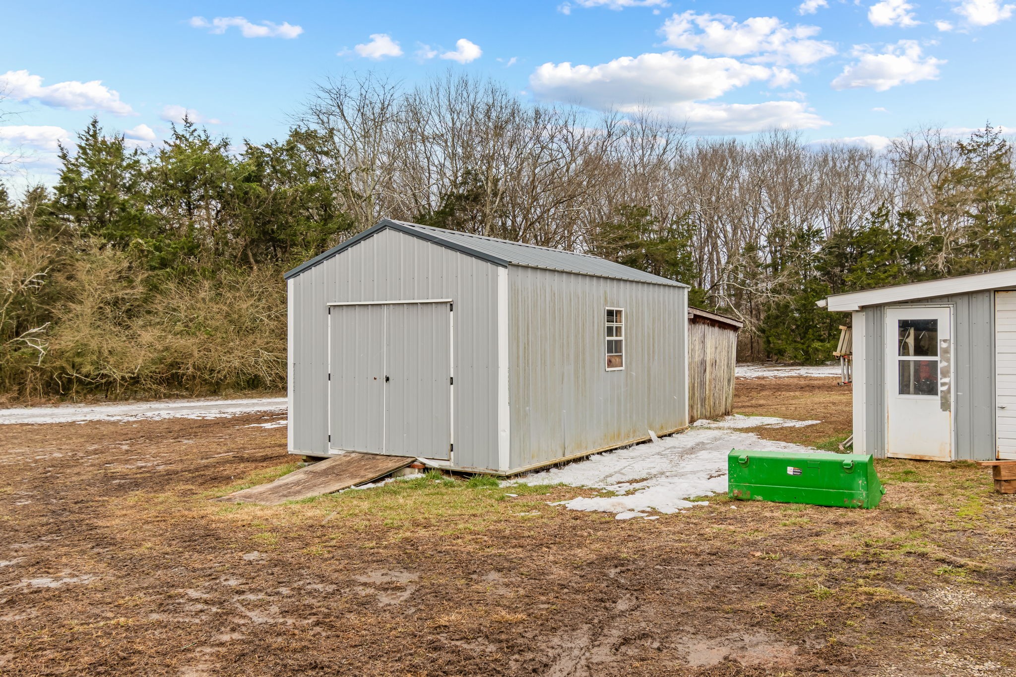 253 Henslee Road Shelbyville, TN 37160 - Photo 30 of 47 a view of a backyard of the house