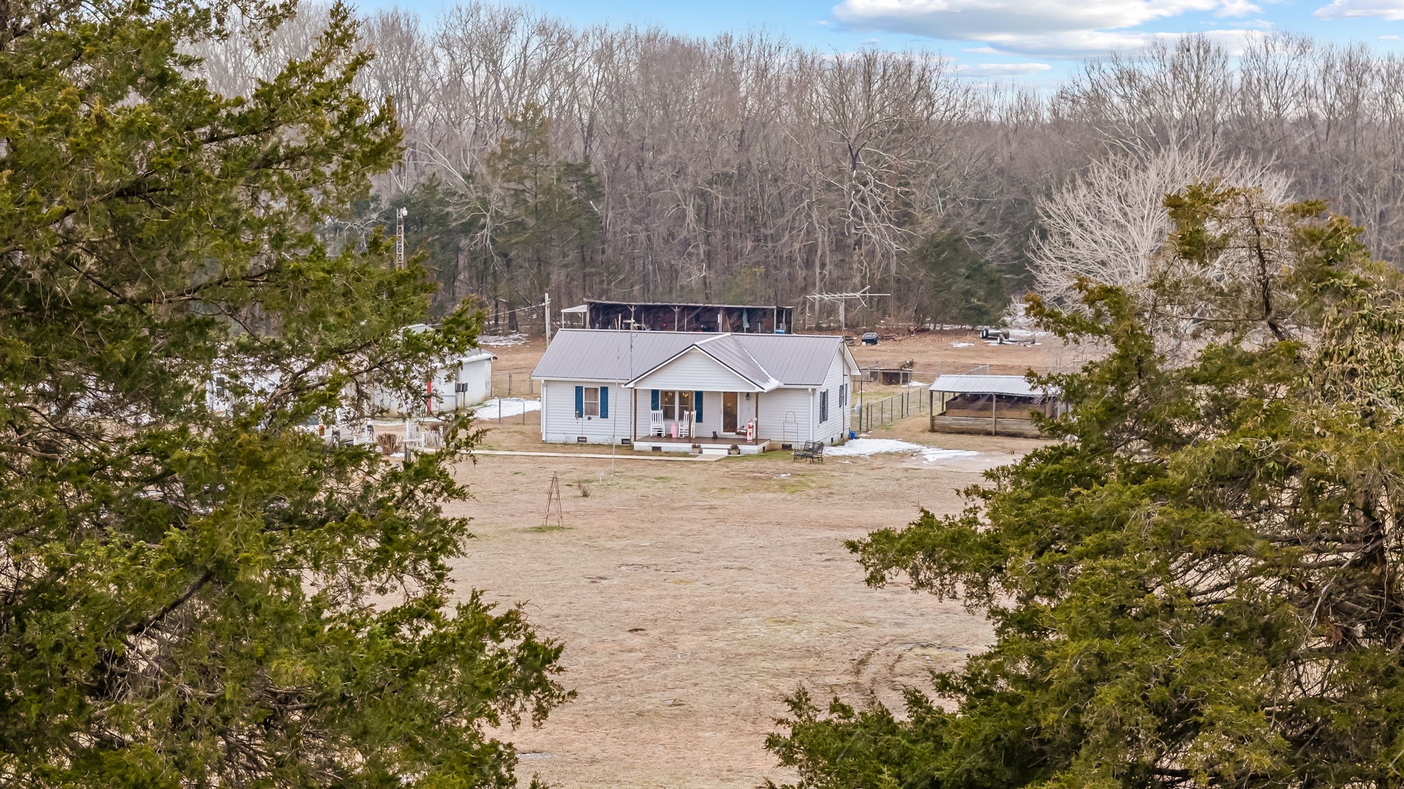 253 Henslee Road Shelbyville, TN 37160 - Photo 46 of 47 a view of a house with large trees