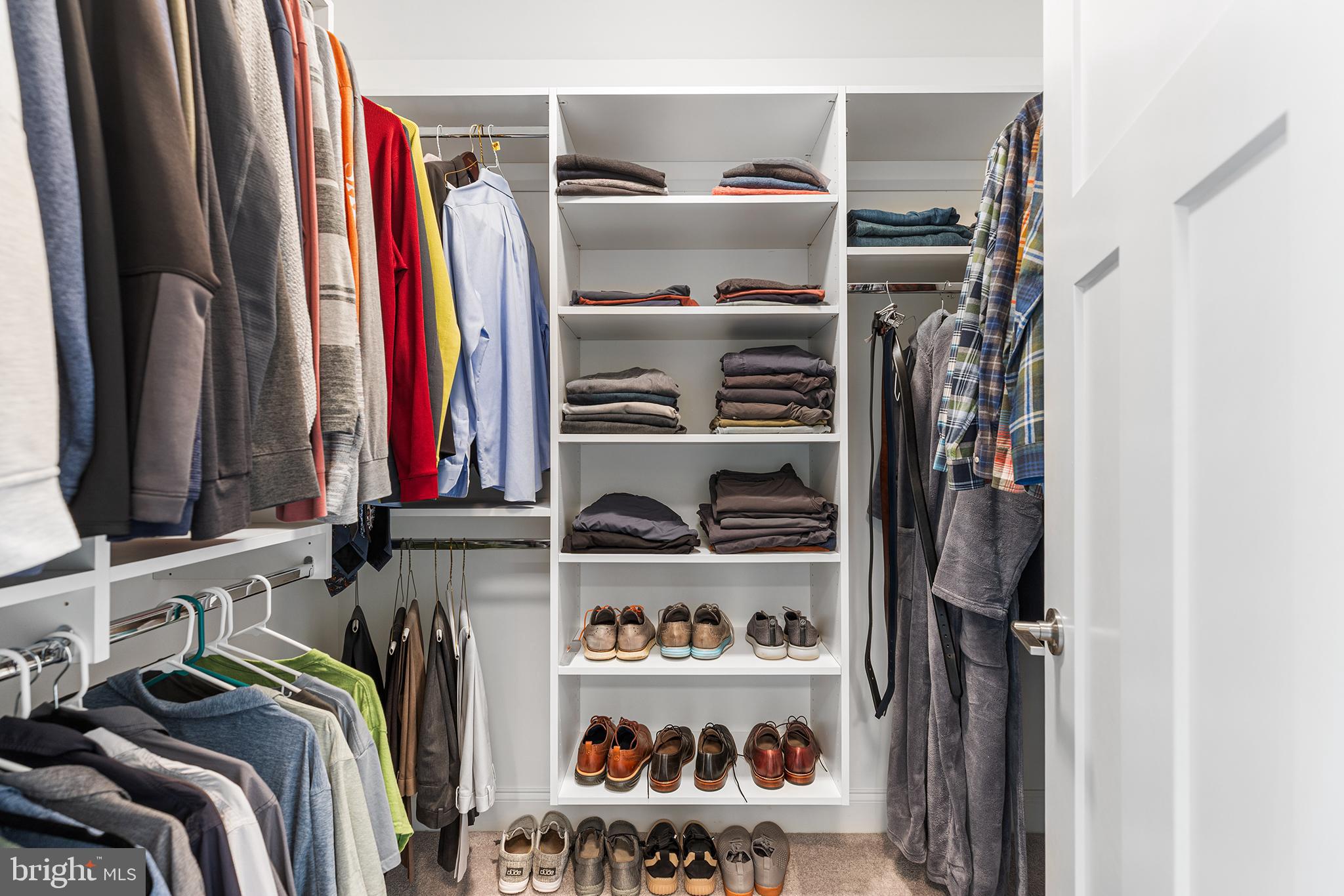 1407 Hagys Ford Road Penn Valley, PA 19072 - Photo 24 of 51 a view of walk in closet with clothes and shoes