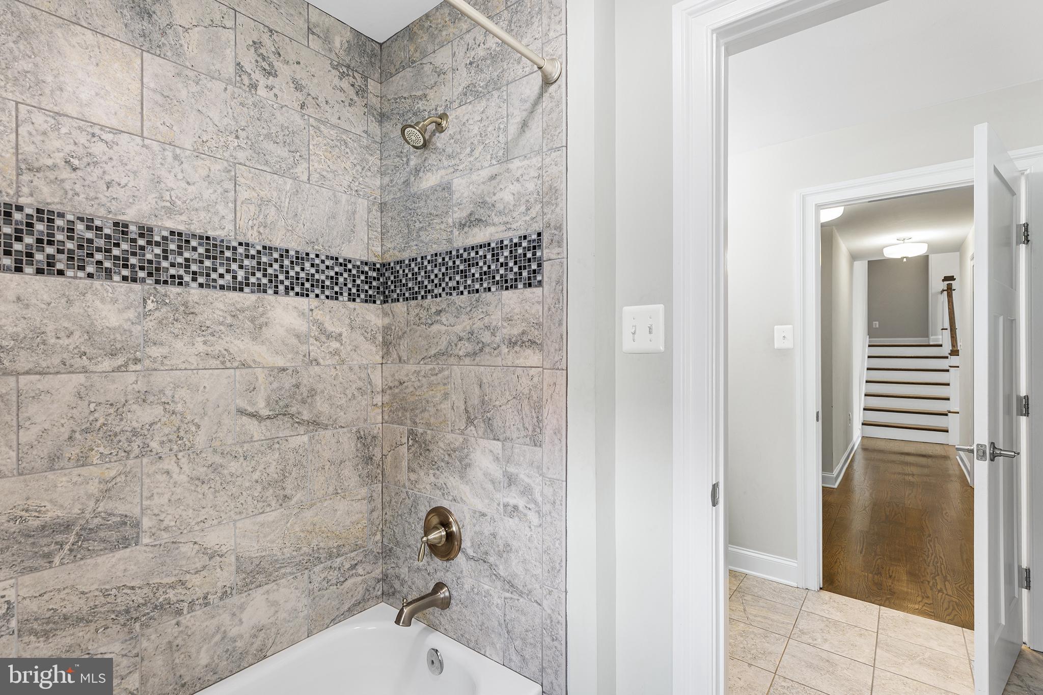 1407 Hagys Ford Road Penn Valley, PA 19072 - Photo 32 of 51 a bathroom with a shower