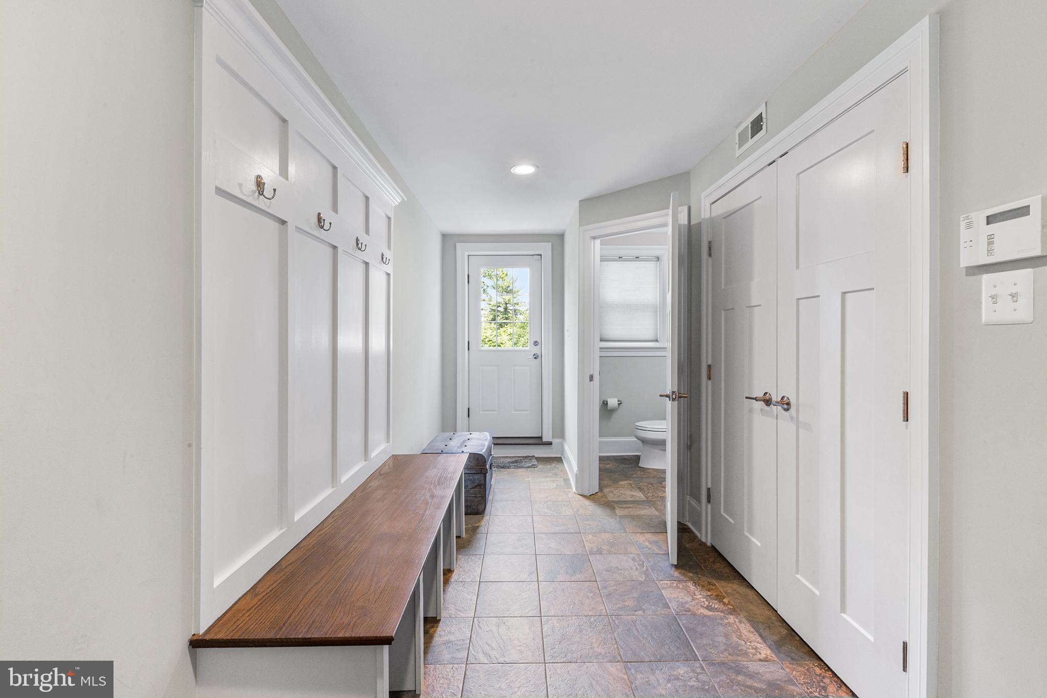 1407 Hagys Ford Road Penn Valley, PA 19072 - Photo 44 of 51 a view of a hallway with closet and a bathroom