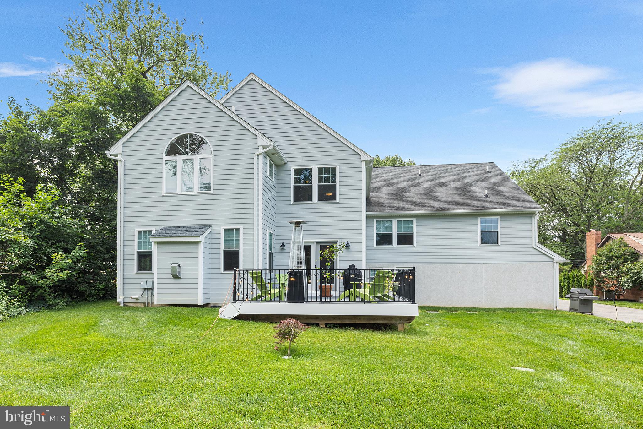 1407 Hagys Ford Road Penn Valley, PA 19072 - Photo 48 of 51 a front view of a house with a garden and yard