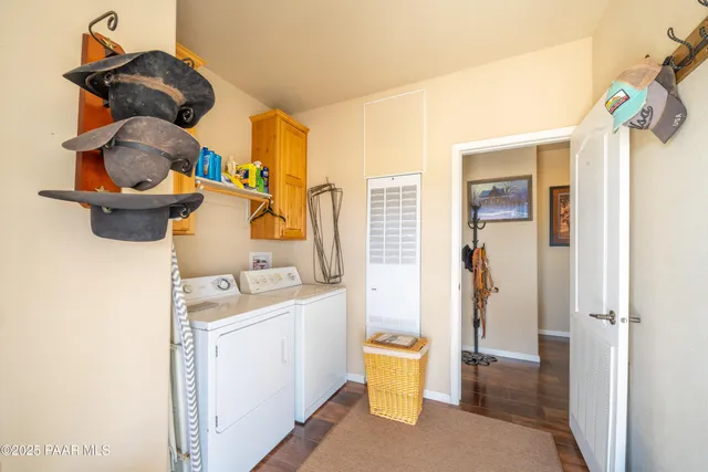 a bathroom with a sink vanity mirror and a bathtub