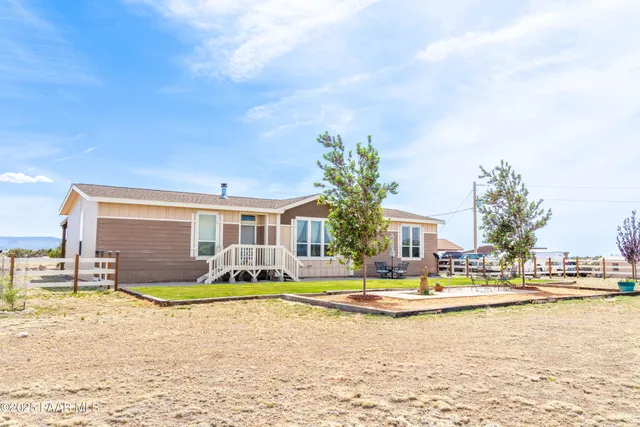 a view of swimming pool with outdoor seating