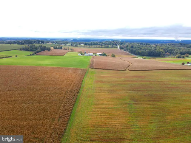 a view of an ocean and city