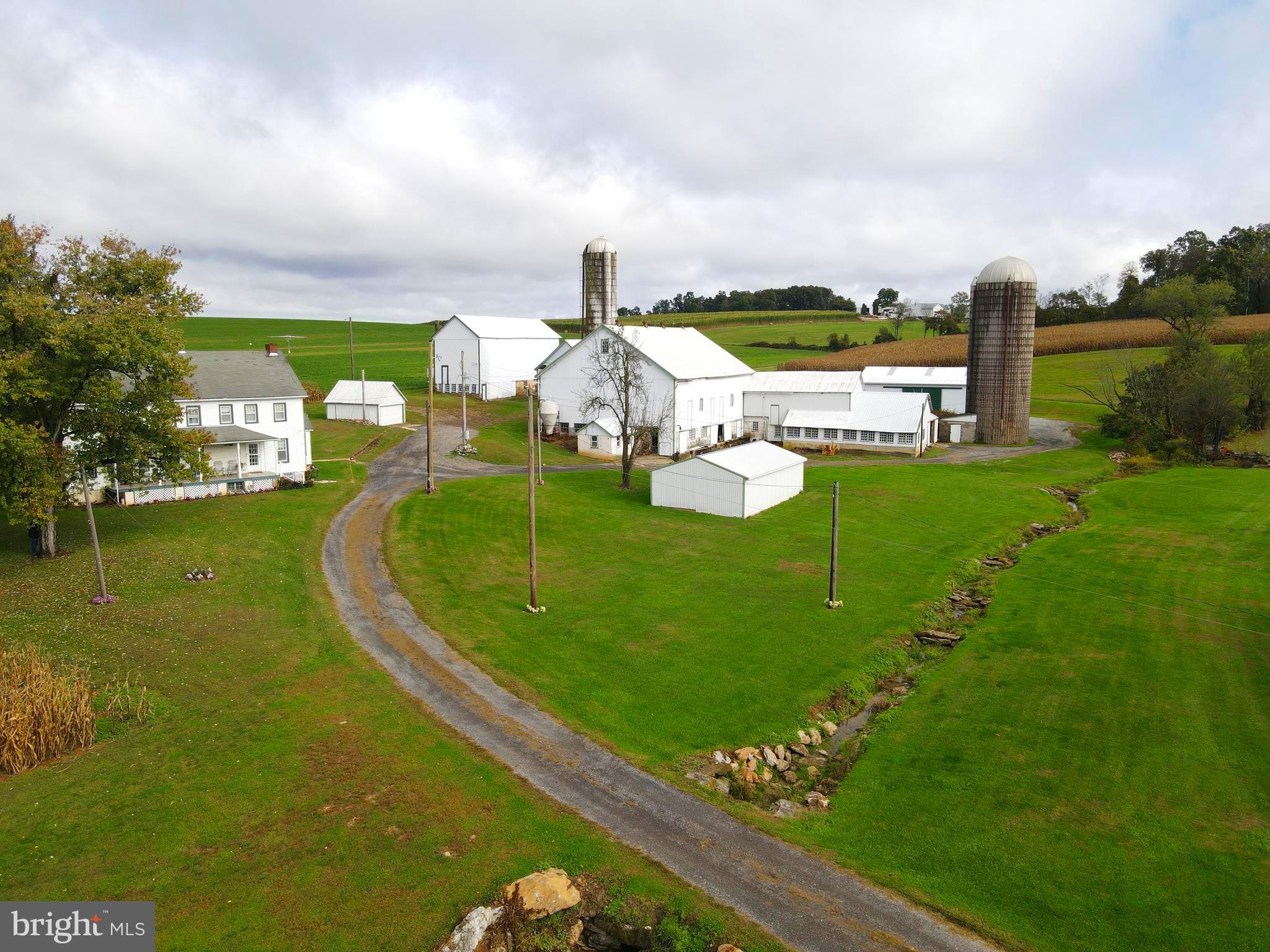 888 Hilldale Road Holtwood, PA 17532 - Photo 33 of 47 a view of a lake with a big yard