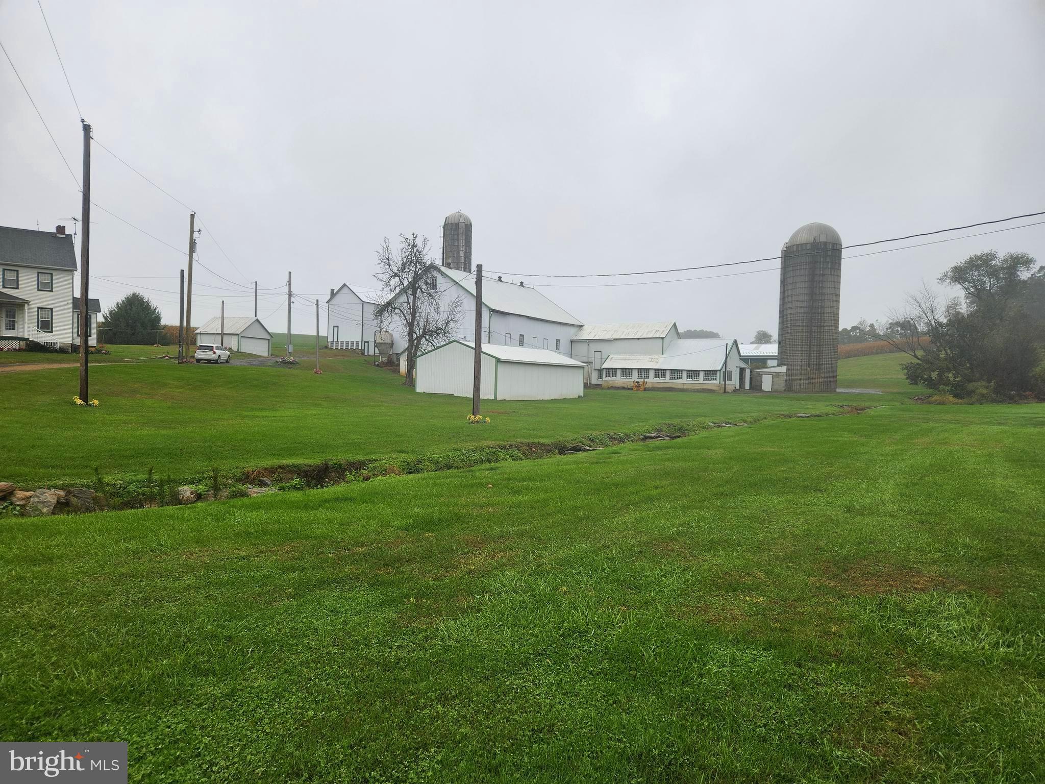 888 Hilldale Road Holtwood, PA 17532 - Photo 4 of 47 a view of a garden with a large bridge
